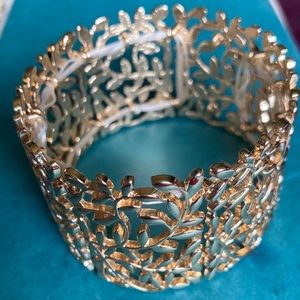 Vintage, gold colored, stretchy